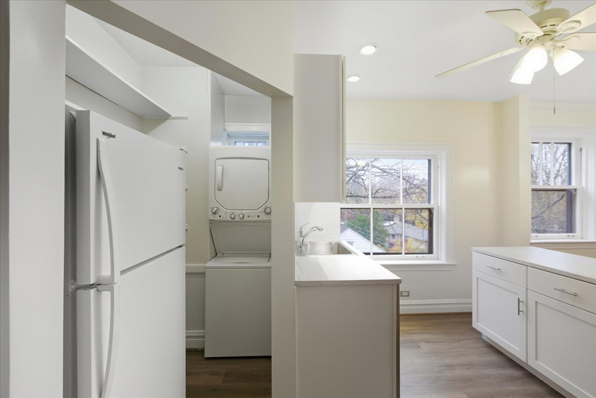 1507 Dobson Street, Unit 3 Evanston, IL 60202 - Photo 9 of 14 a kitchen with a refrigerator and a sink