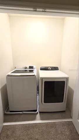 a utility room with a washer and dryer