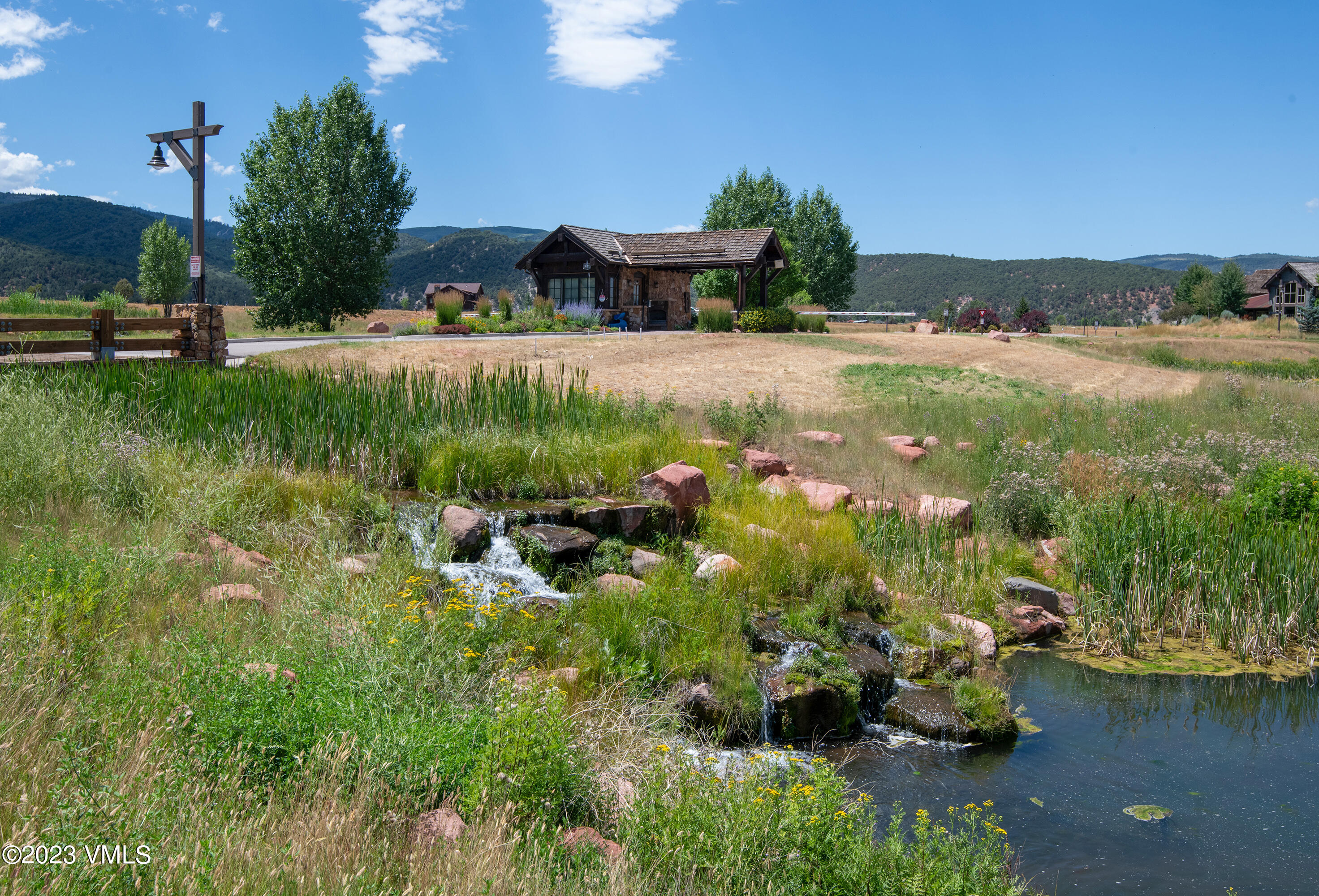 172 Tallgrass Gypsum, CO 81637 - Photo 5 of 15 a view of a lake with houses