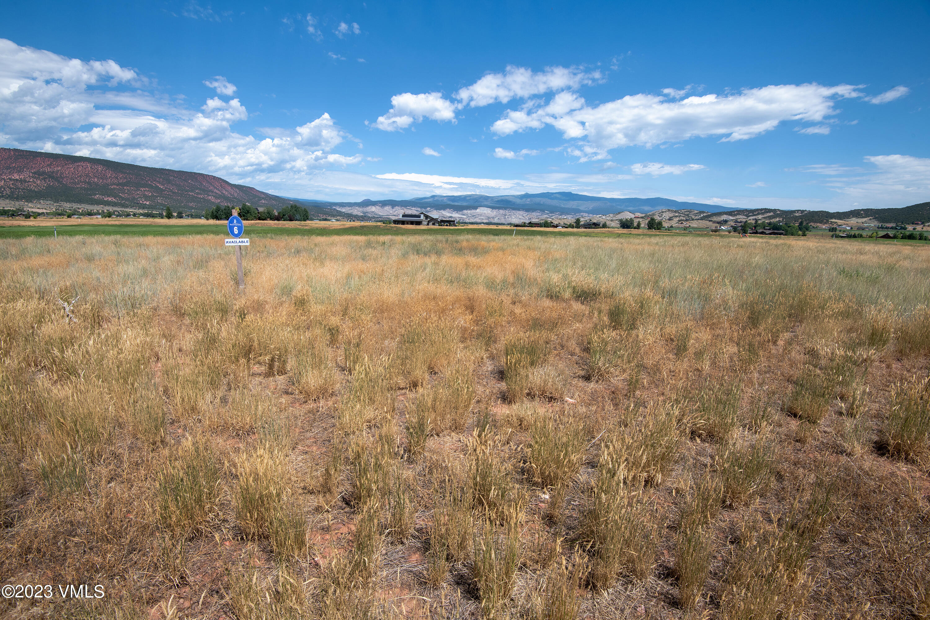 172 Tallgrass Gypsum, CO 81637 - Photo 8 of 15 a view of a lake from a yard