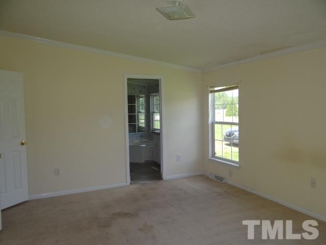6393 Nichols Rd Spring Spring Hope, NC 27882 - Photo 8 of 15 an empty room with windows