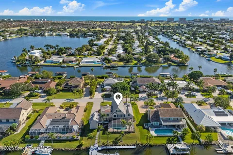 a spacious bathroom with a granite countertop sink and a mirror