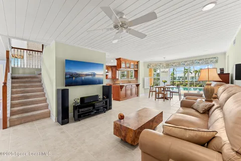 a bedroom with two beds and a window