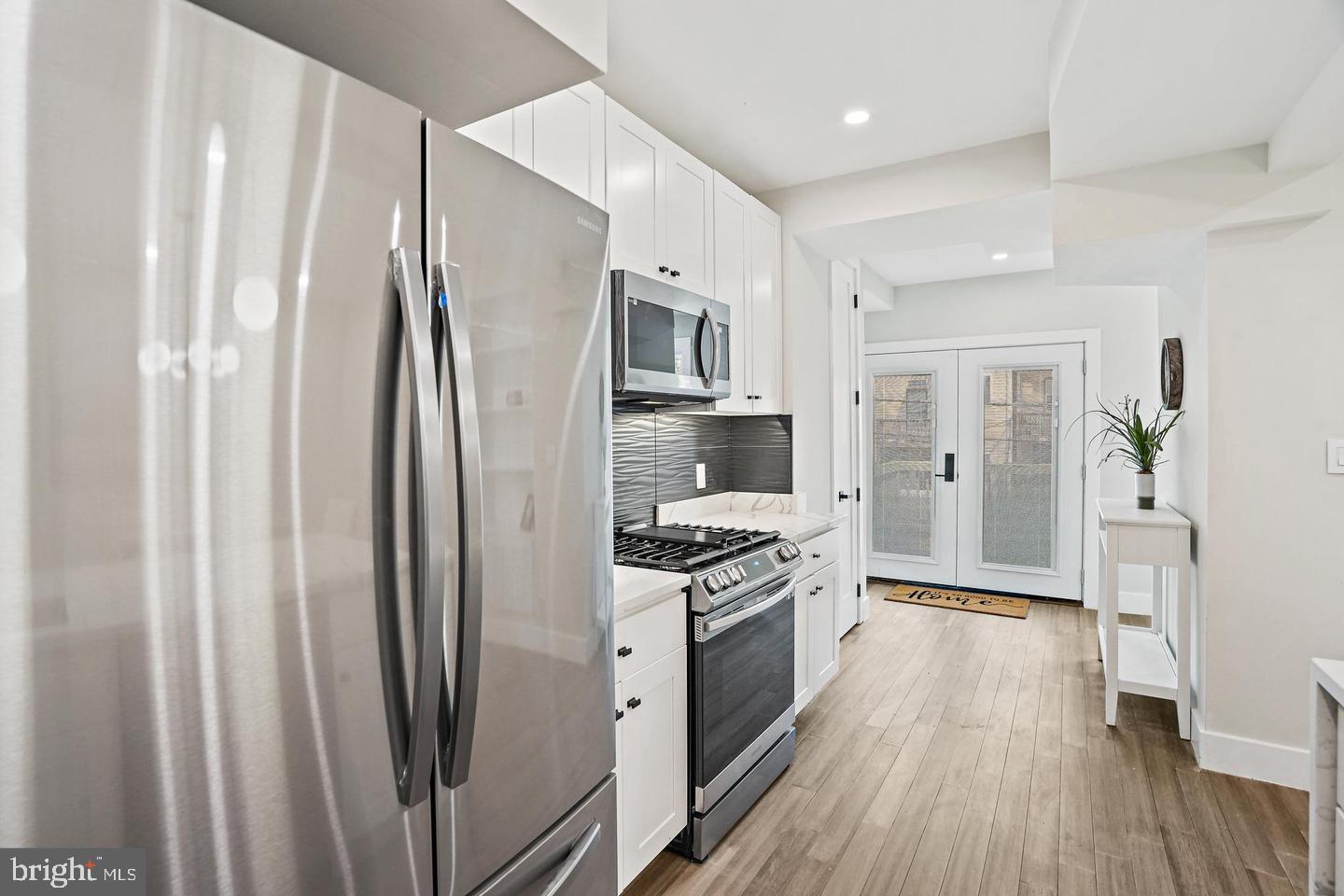 719 Quebec Place Northwest Washington, DC 20010 - Photo 12 of 32 Modern kitchen with sleek appliances.
