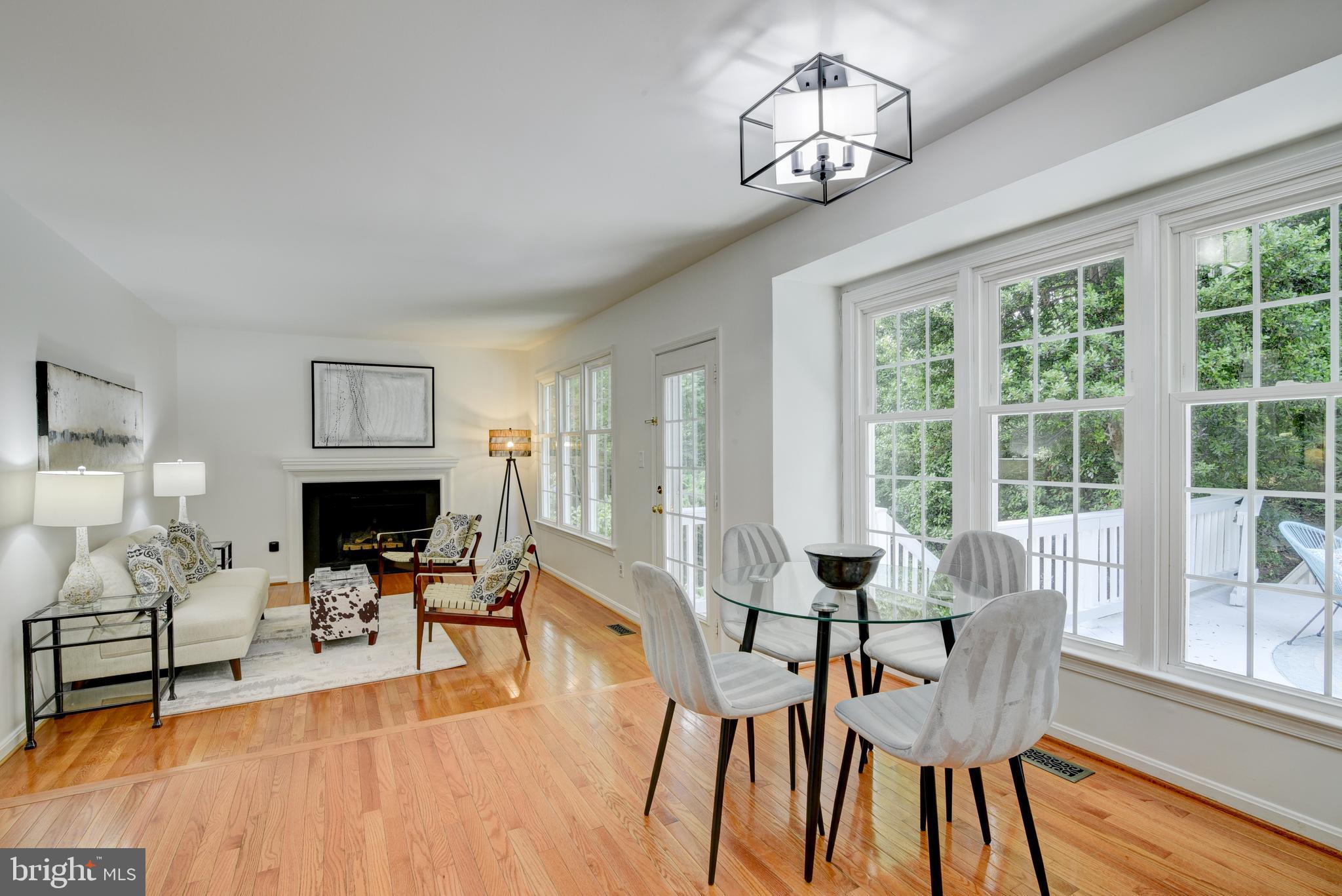 11600 Springhouse Place Reston, VA 20194 - Photo 5 of 28 Walls of Windows: Breakfast Nook and Family Room.