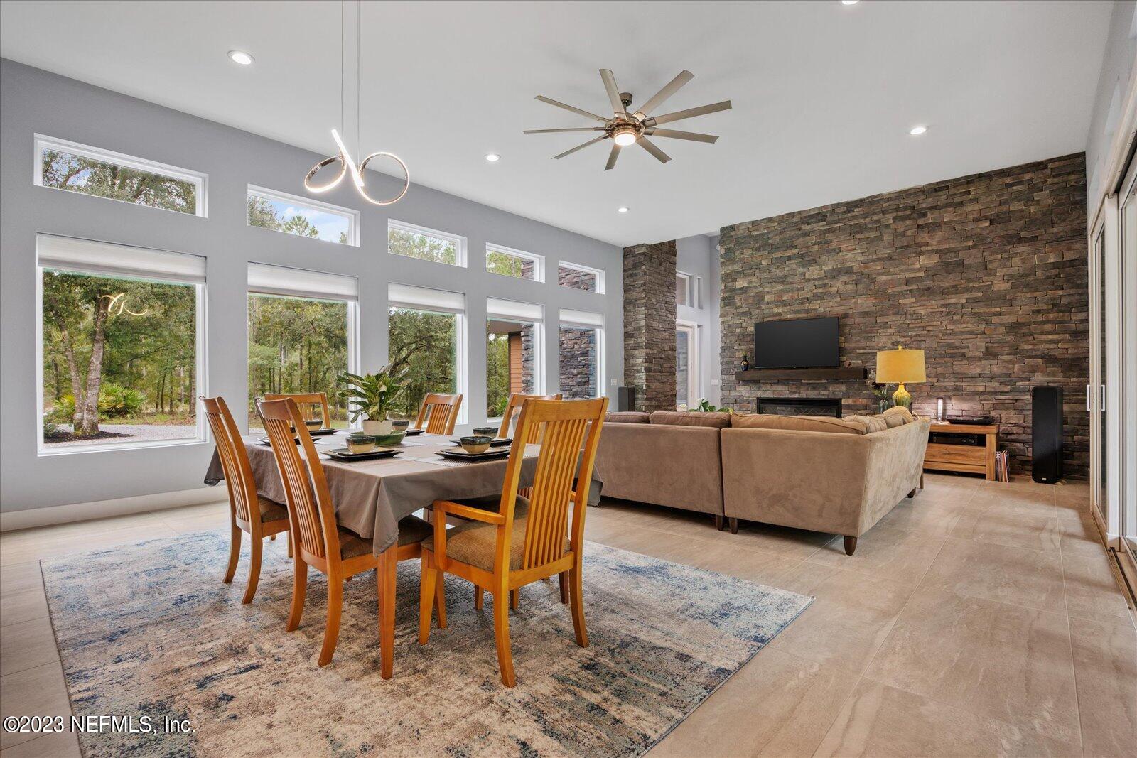 13535 Settindown Drive Bryceville, FL 32009 - Photo 17 of 59 a view of a dining room with furniture window and outside view