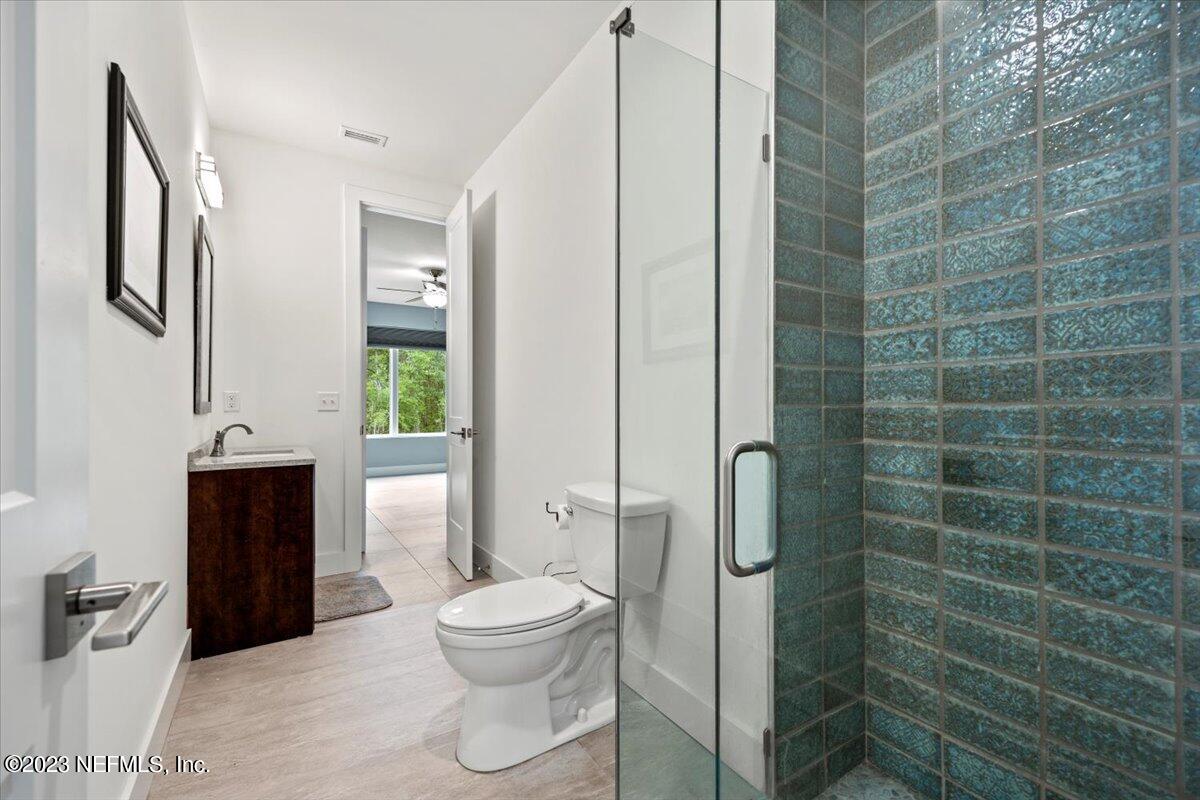 13535 Settindown Drive Bryceville, FL 32009 - Photo 41 of 59 a bathroom with a toilet and a shower