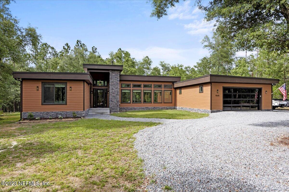 13535 Settindown Drive Bryceville, FL 32009 - Photo 5 of 59 a view of a house with a yard