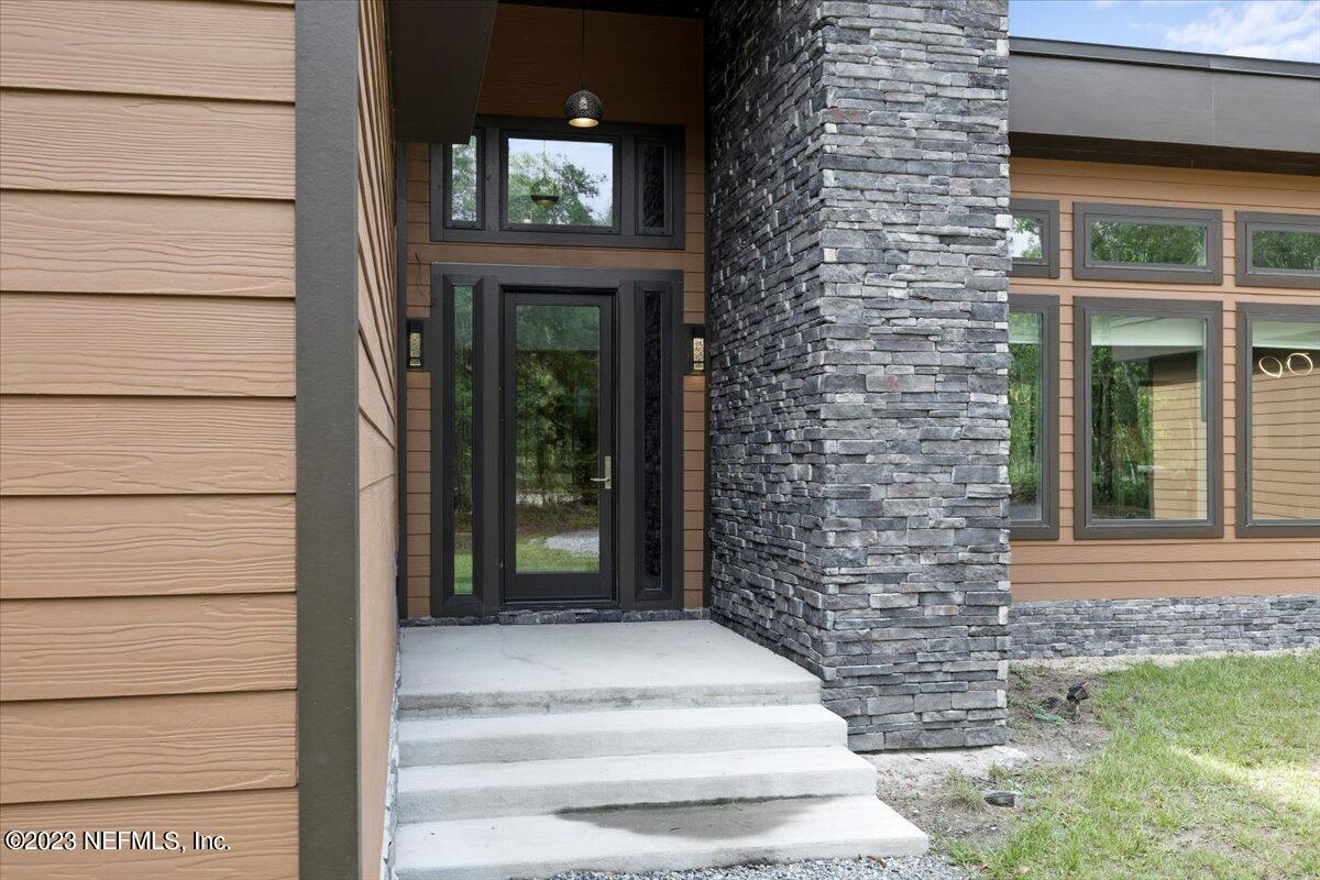 13535 Settindown Drive Bryceville, FL 32009 - Photo 10 of 59 a view of entrance front of house