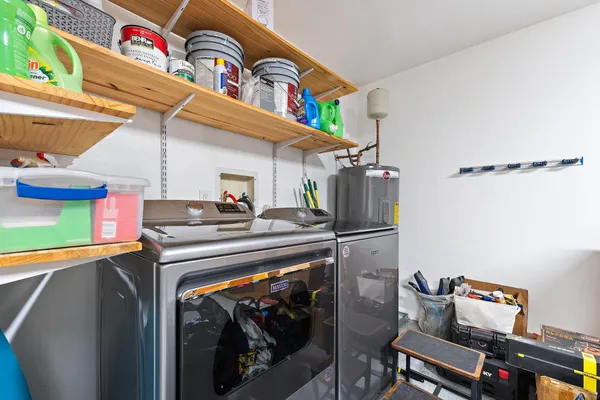 a bedroom with bed and window