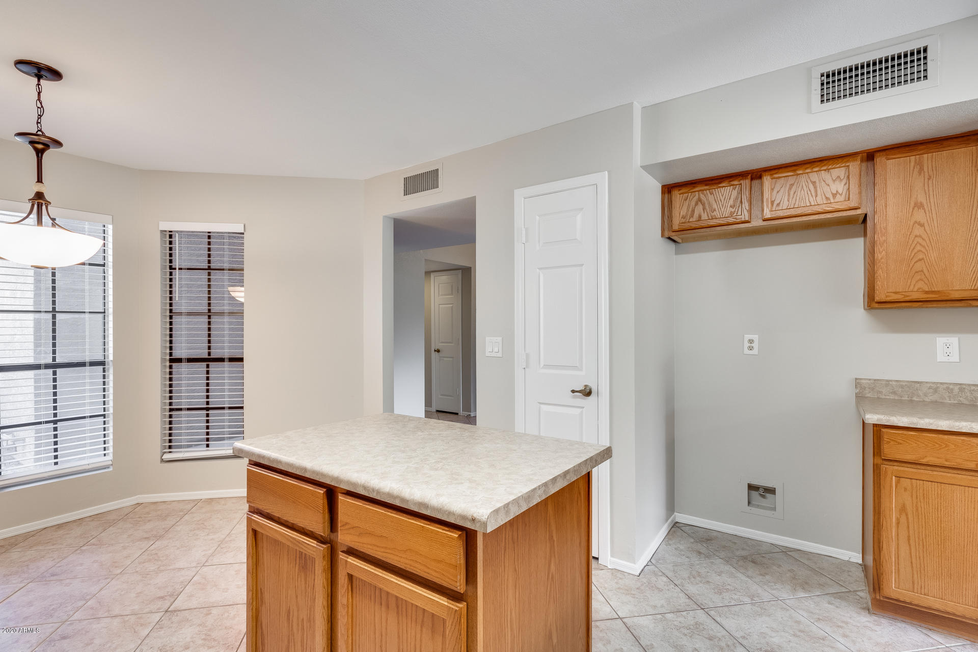 4157 East Agave Road Phoenix, AZ 85044 - Photo 18 of 33 a view of kitchen with cabinets