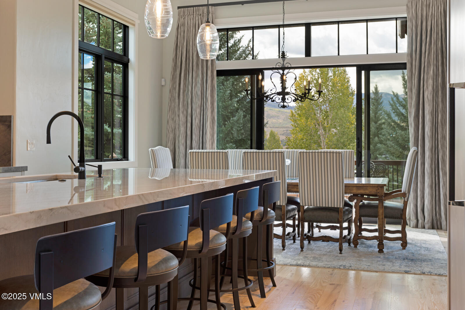 130 Fall Creek Road Edwards, CO 81632 - Photo 11 of 52 a dining table with chairs and window