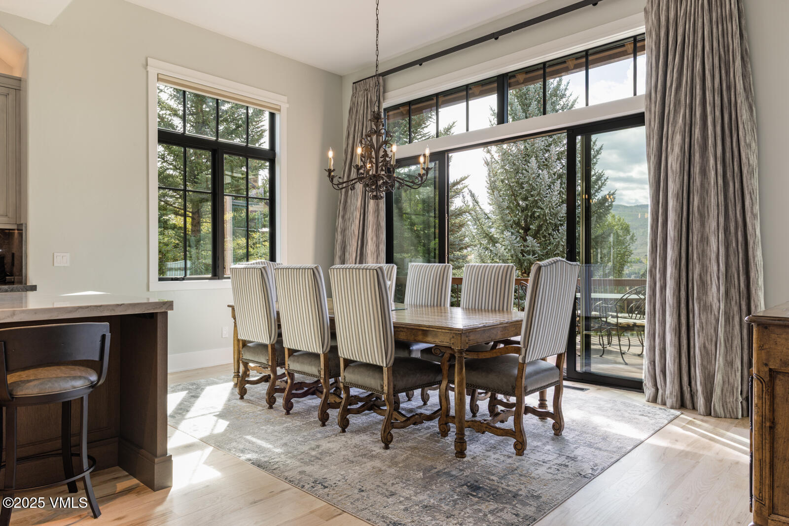 130 Fall Creek Road Edwards, CO 81632 - Photo 16 of 52 a view of a dining room with furniture window and outside view