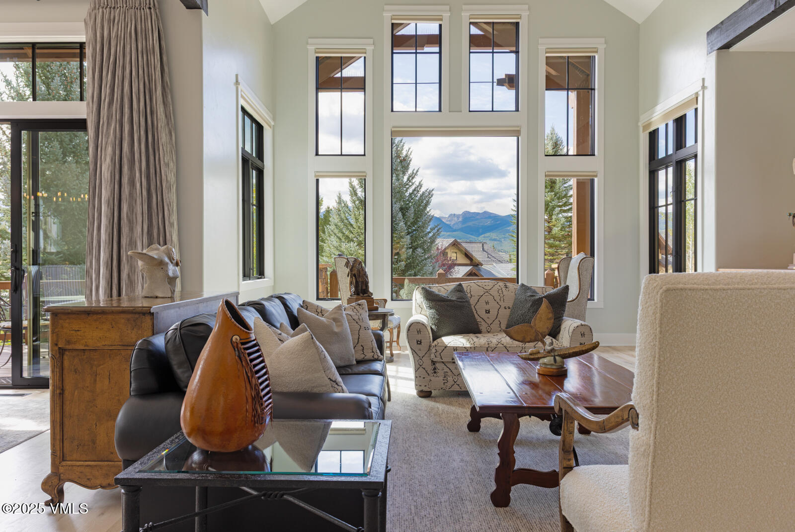130 Fall Creek Road Edwards, CO 81632 - Photo 17 of 52 a living room with furniture fireplace and large window