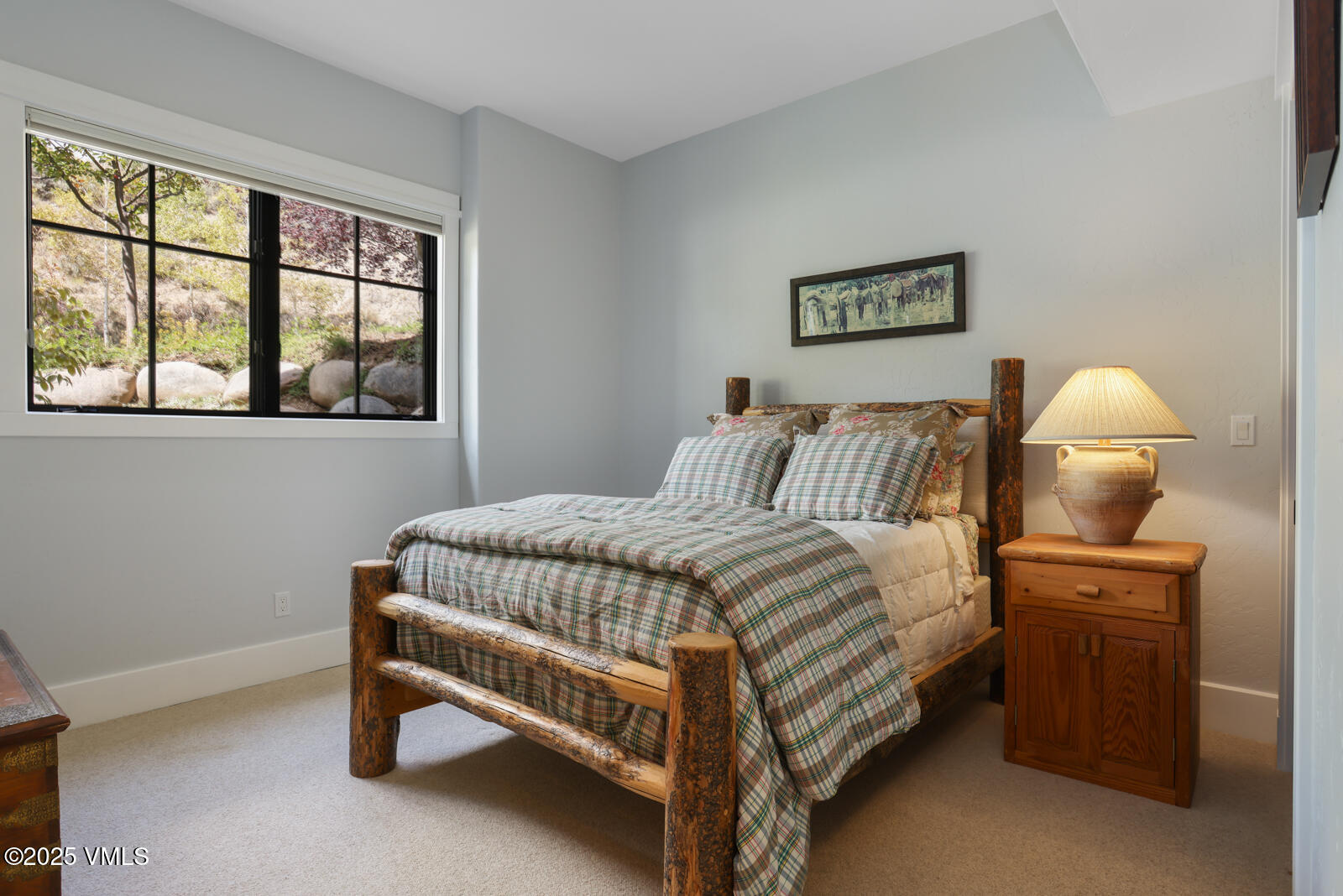 130 Fall Creek Road Edwards, CO 81632 - Photo 32 of 52 a bedroom with a bed and window