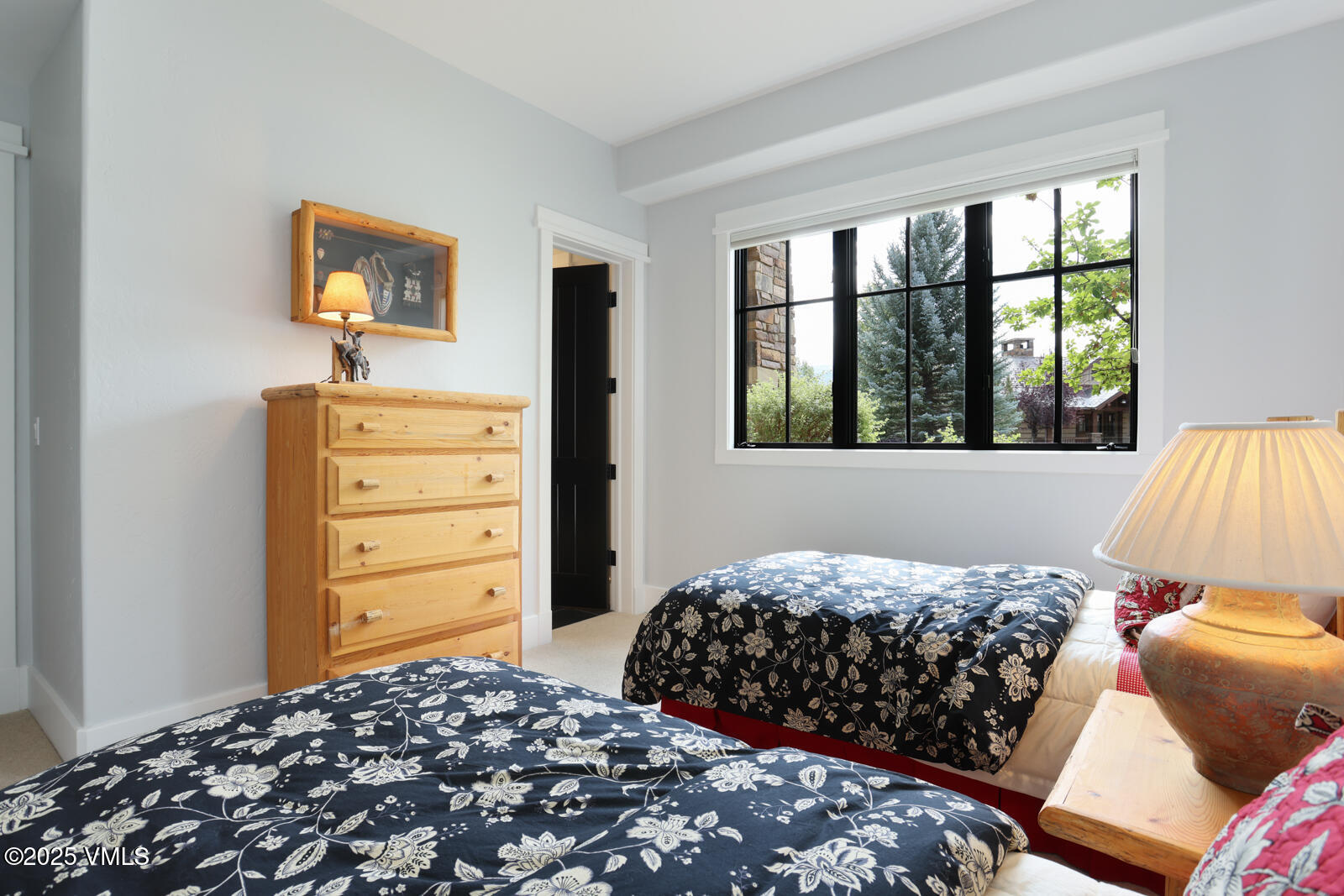 130 Fall Creek Road Edwards, CO 81632 - Photo 36 of 52 a bedroom with a bed and window