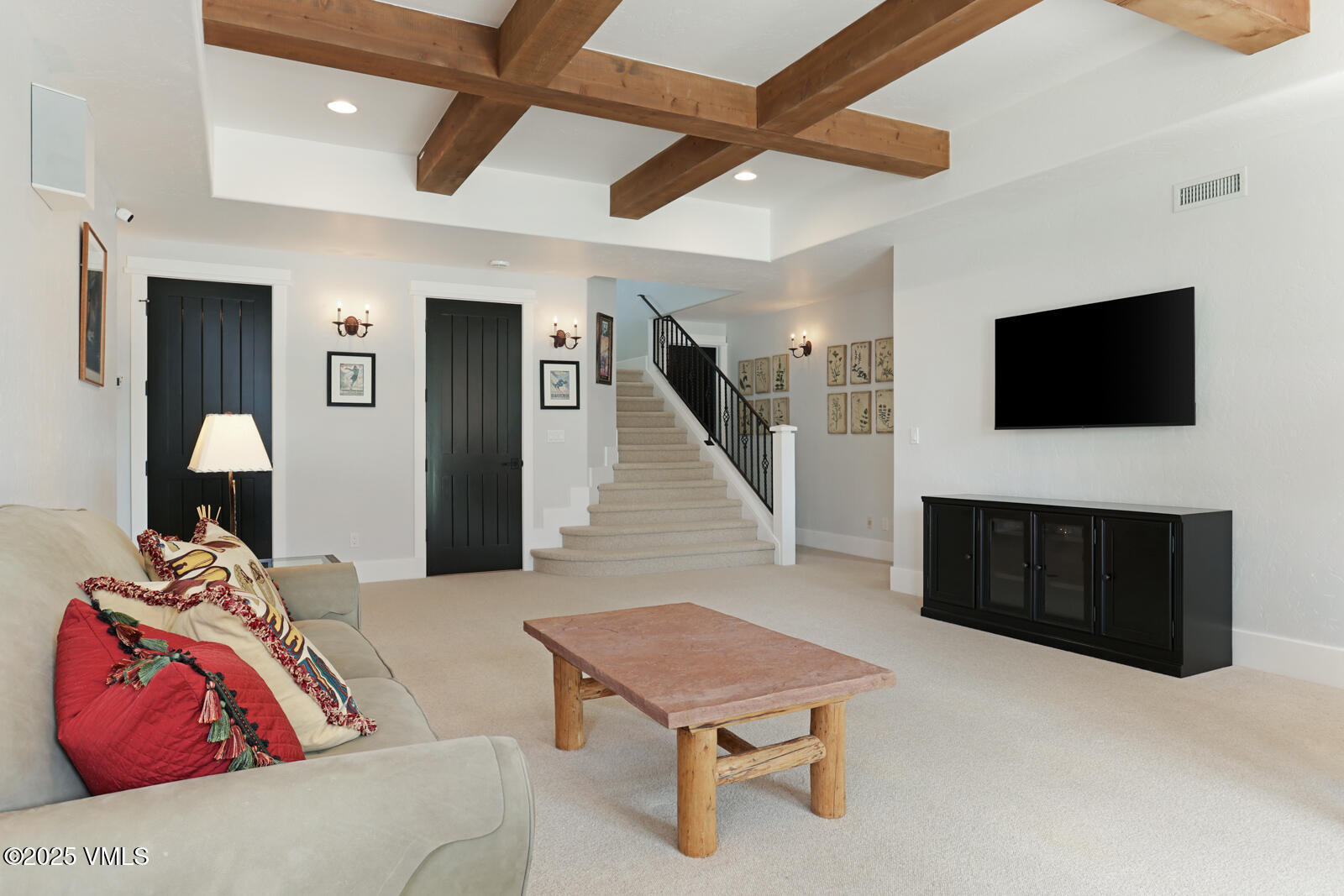 130 Fall Creek Road Edwards, CO 81632 - Photo 39 of 52 a living room with furniture and a flat screen tv