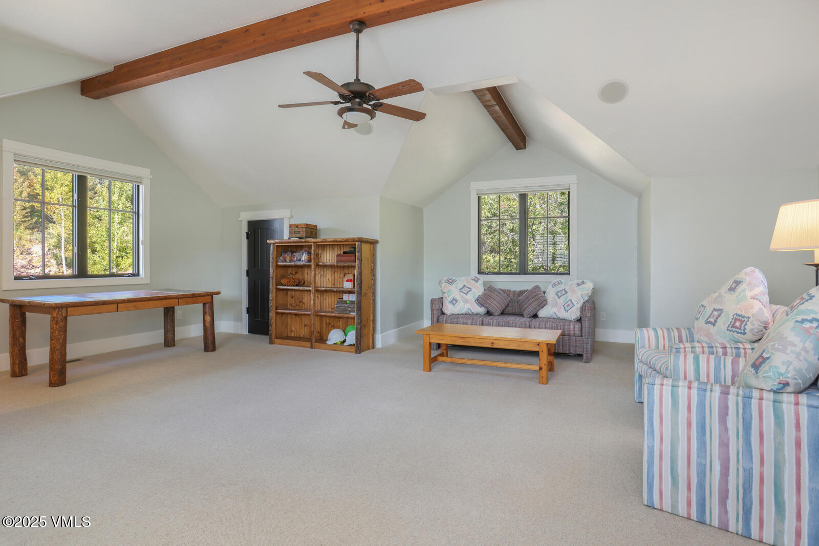 130 Fall Creek Road Edwards, CO 81632 - Photo 40 of 52 a bedroom with furniture and a window