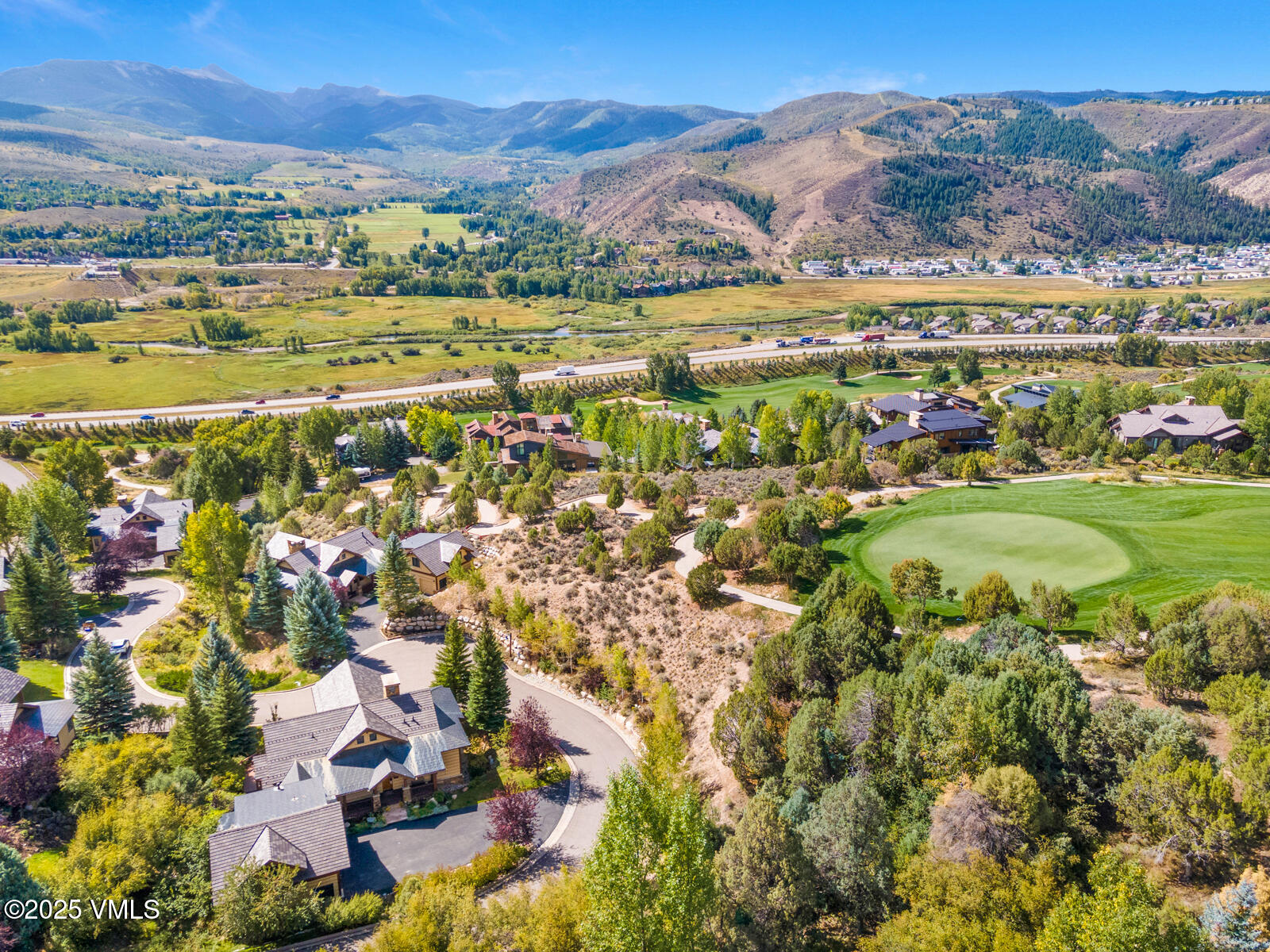 130 Fall Creek Road Edwards, CO 81632 - Photo 46 of 52 a view of a city with mountains in the background