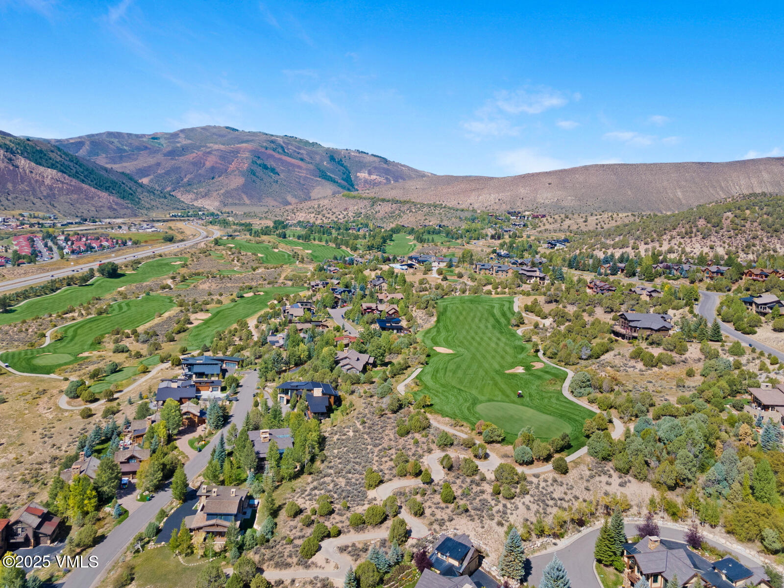 130 Fall Creek Road Edwards, CO 81632 - Photo 48 of 52 a view of a lush green hillside and houses