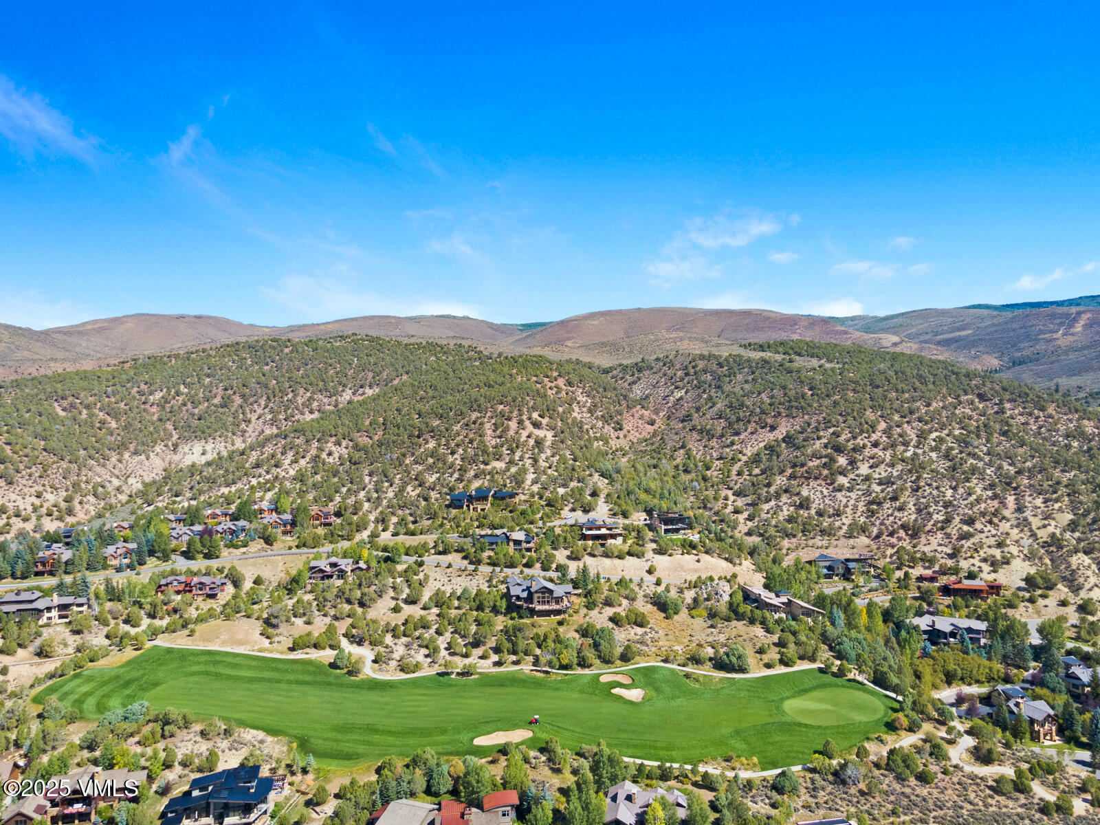 130 Fall Creek Road Edwards, CO 81632 - Photo 50 of 52 a view of a city with mountains in the background