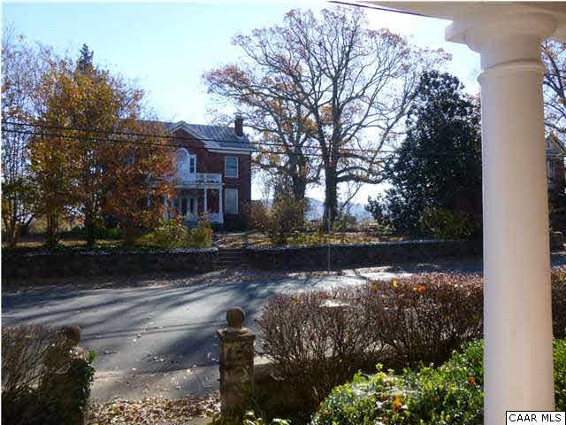 701 Ridge Street Charlottesville, VA 22902 - Photo 3 of 48 a view of a yard with plants and large trees