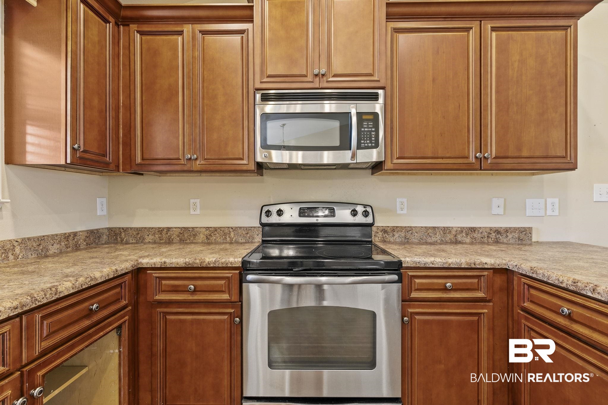 11153 Sturbridge Loop Daphne, AL 36526 - Photo 32 of 79 Kitchen featuring appliances with stainless steel finishes and light stone counters
