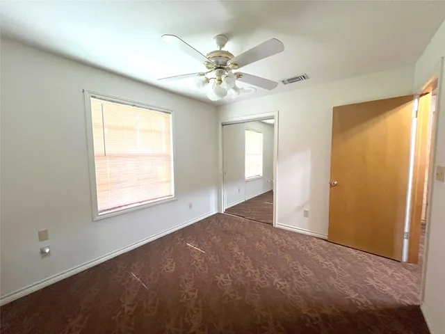 a bathroom with a sink a toilet and a shower