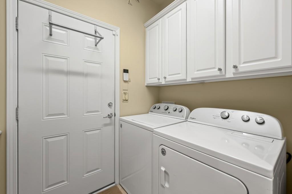 1081 Spring Station Road Greensboro, GA 30642 - Photo 28 of 35 a utility room with dryer and washer