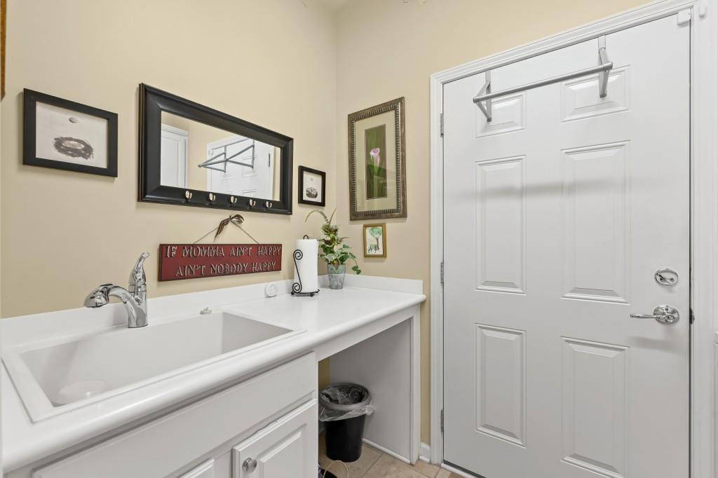 1081 Spring Station Road Greensboro, GA 30642 - Photo 29 of 35 a bathroom with a sink and a mirror