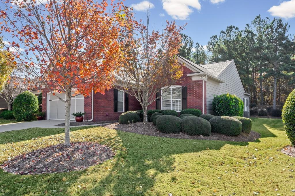 1081 Spring Station Road Greensboro, GA 30642 - Photo 3 of 35 a front view of a house with a yard