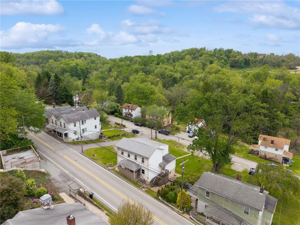 680 Main Street Irwin, PA 15642 - Photo 40 of 41 an aerial view of a city with lots of residential buildings
