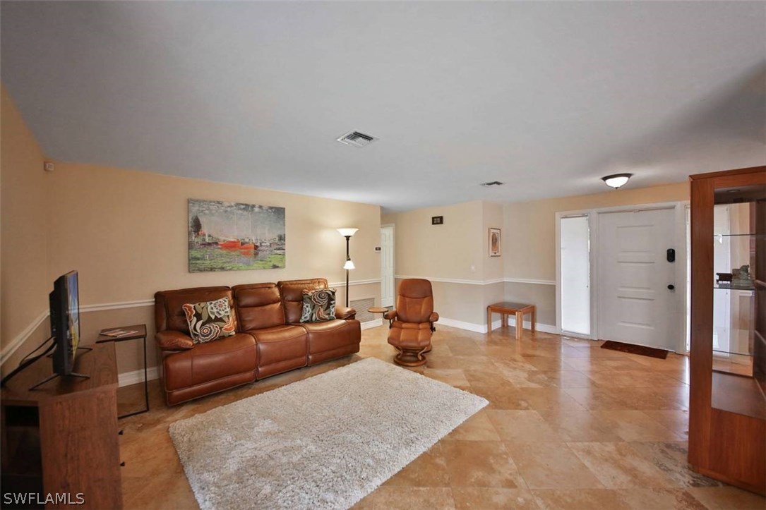 1650 North Mayfair Road Fort Myers, FL 33919 - Photo 4 of 24 a living room with furniture