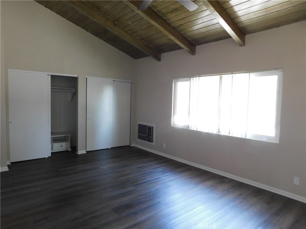 755 Valley View Avenue, Unit B Monrovia, CA 91016 - Photo 12 of 25 an empty room with wooden floor and windows