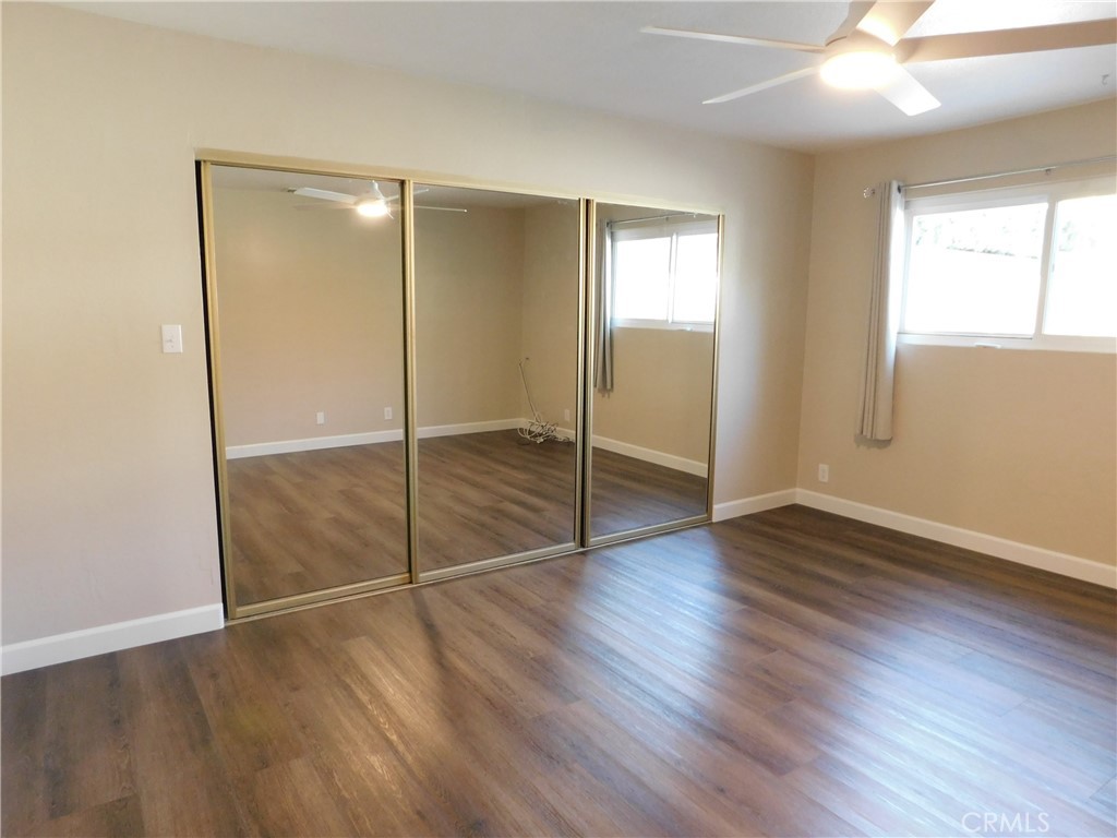 755 Valley View Avenue, Unit B Monrovia, CA 91016 - Photo 18 of 25 a view of an empty room with wooden floor and window