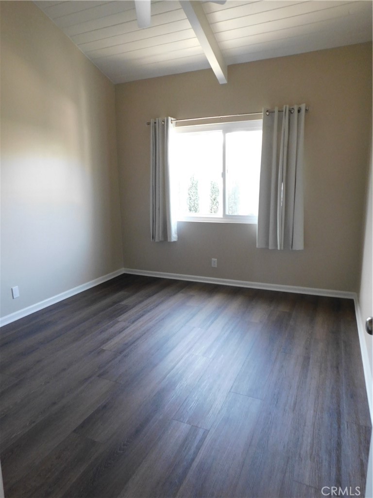 755 Valley View Avenue, Unit B Monrovia, CA 91016 - Photo 23 of 25 an empty room with wooden floor and windows