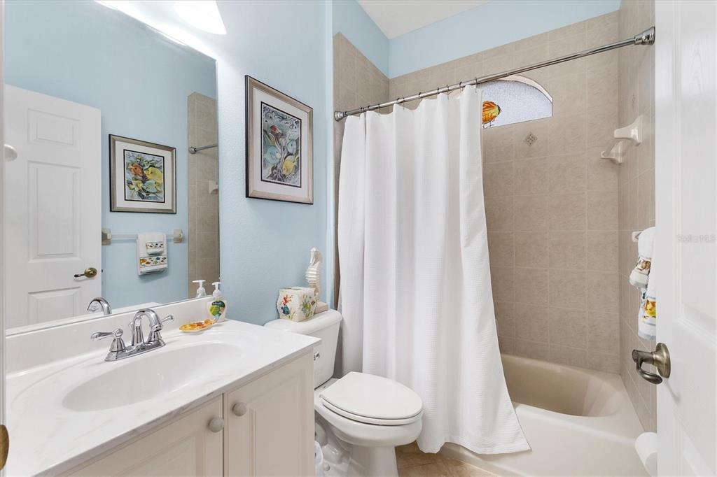 7 Windward Road Placida, FL 33946 - Photo 22 of 34 a bathroom with a sink toilet and shower