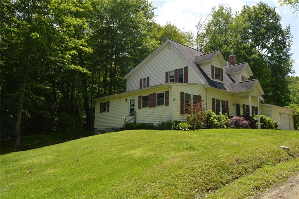 3244 Maple Lane Jamestown, PA 16134 - Photo 22 of 27 a front view of a house with a yard
