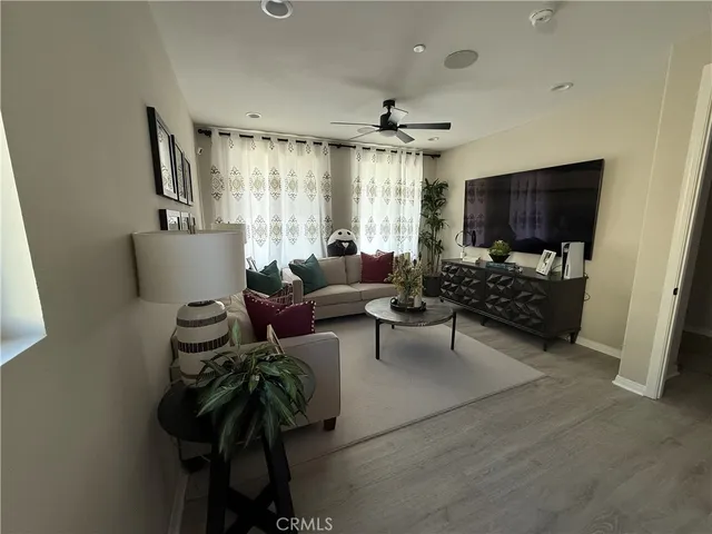 a living room with furniture and a window