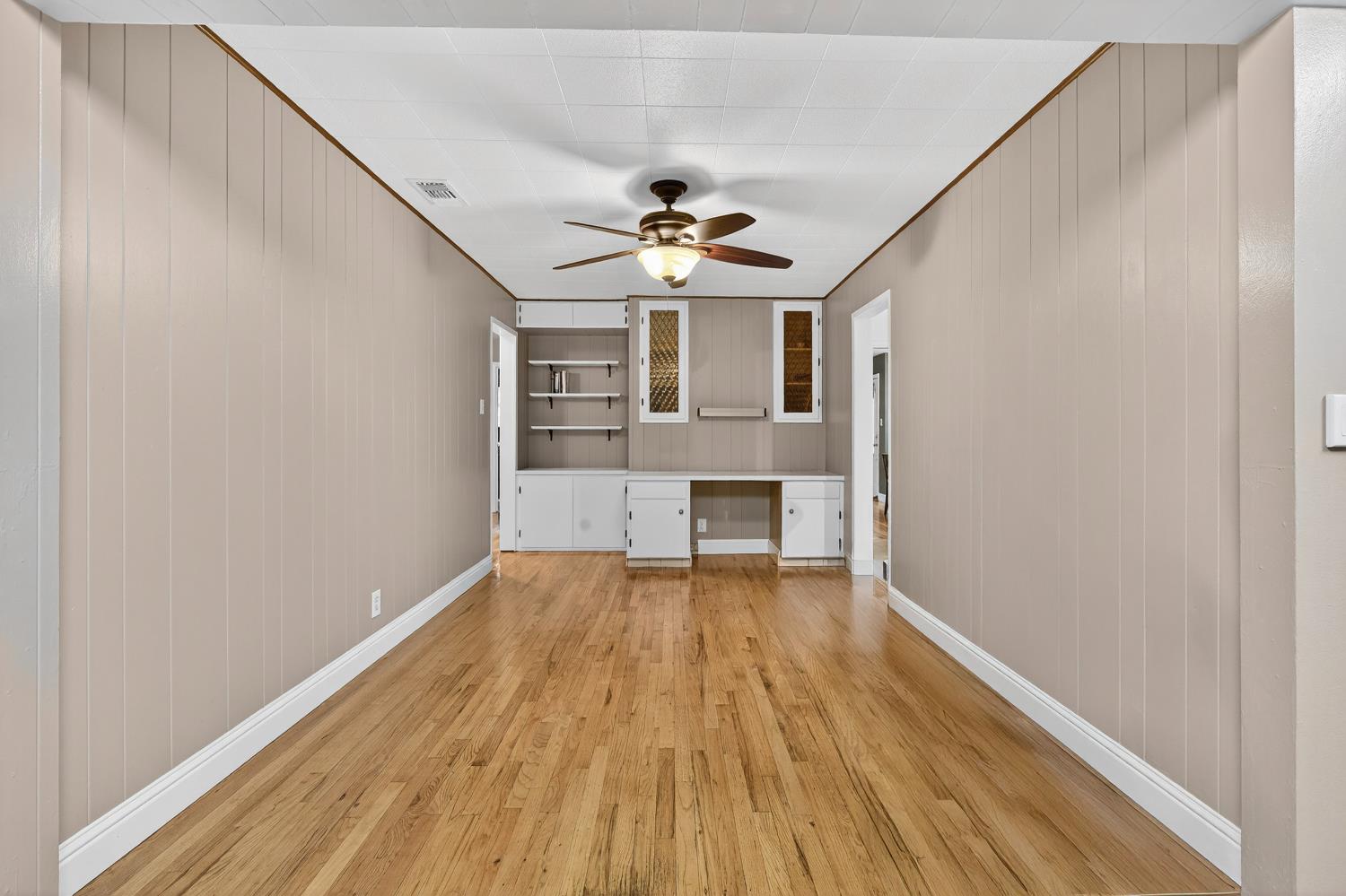 1507 West Locust Street Lodi, CA 95242 - Photo 12 of 28 a view of empty room with wooden floor