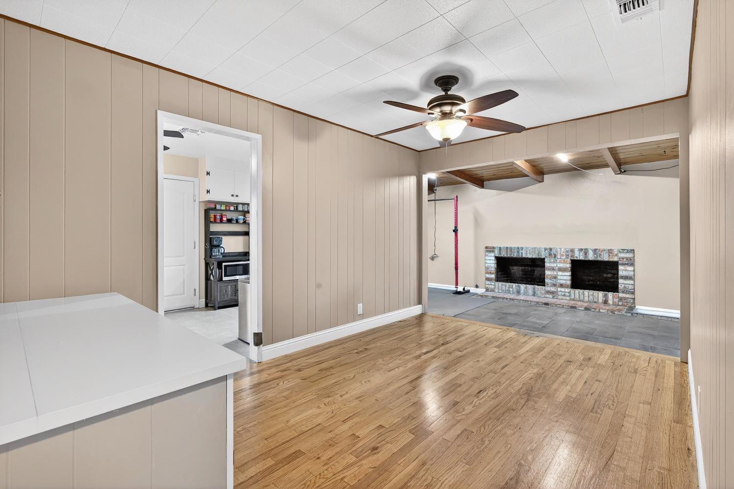 1507 West Locust Street Lodi, CA 95242 - Photo 13 of 28 a view of livingroom with kitchen and ceiling fan