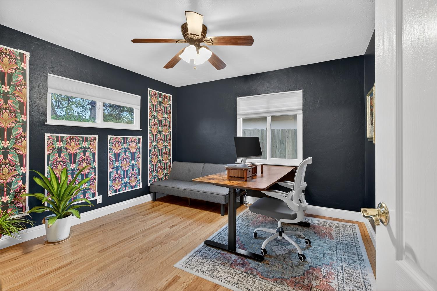1507 West Locust Street Lodi, CA 95242 - Photo 19 of 28 a workspace with furniture window and wooden floor