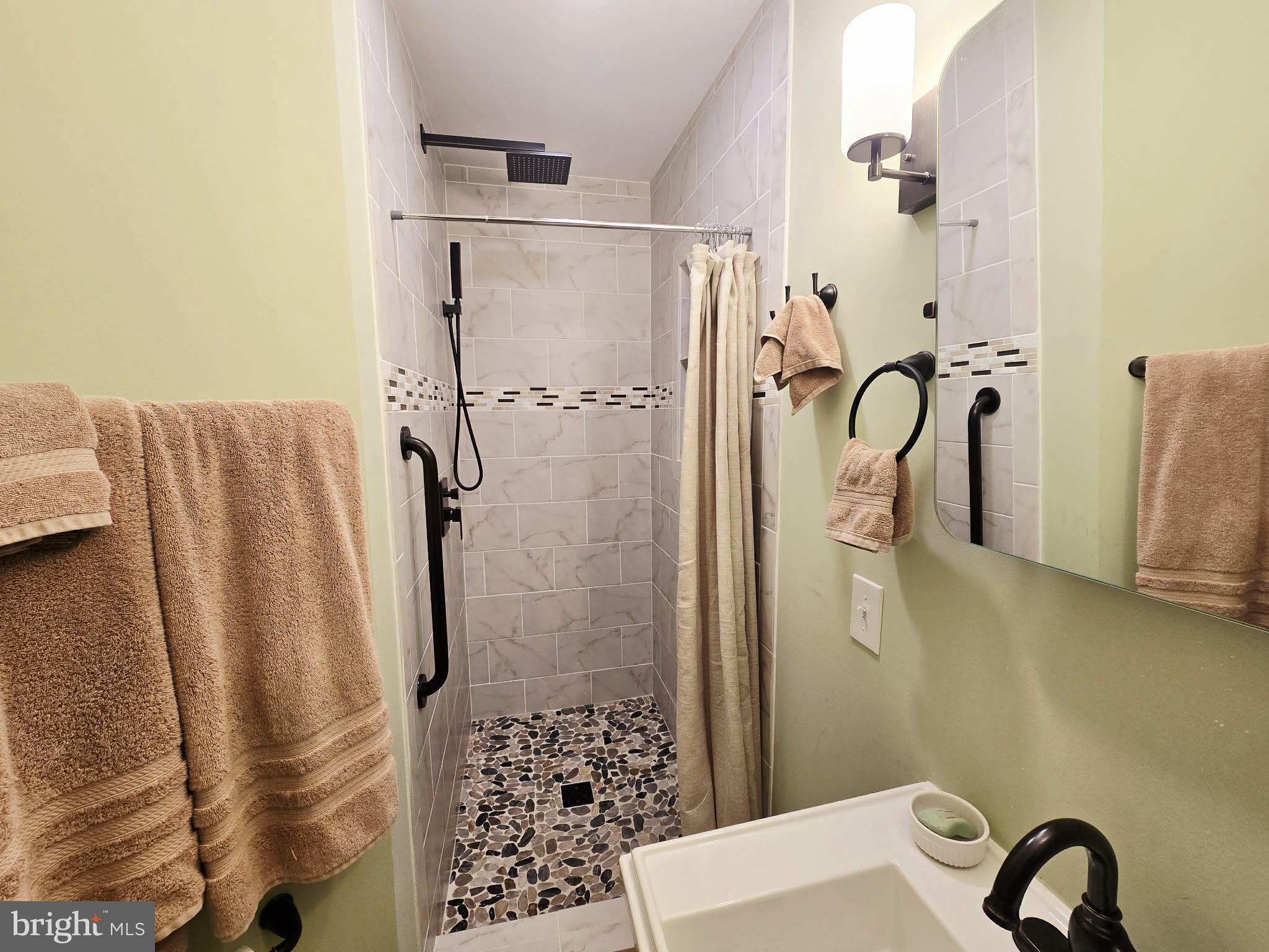 1120 Sandy Ridge Road Sugar Grove, WV 26815 - Photo 15 of 53 a bathroom with a shower