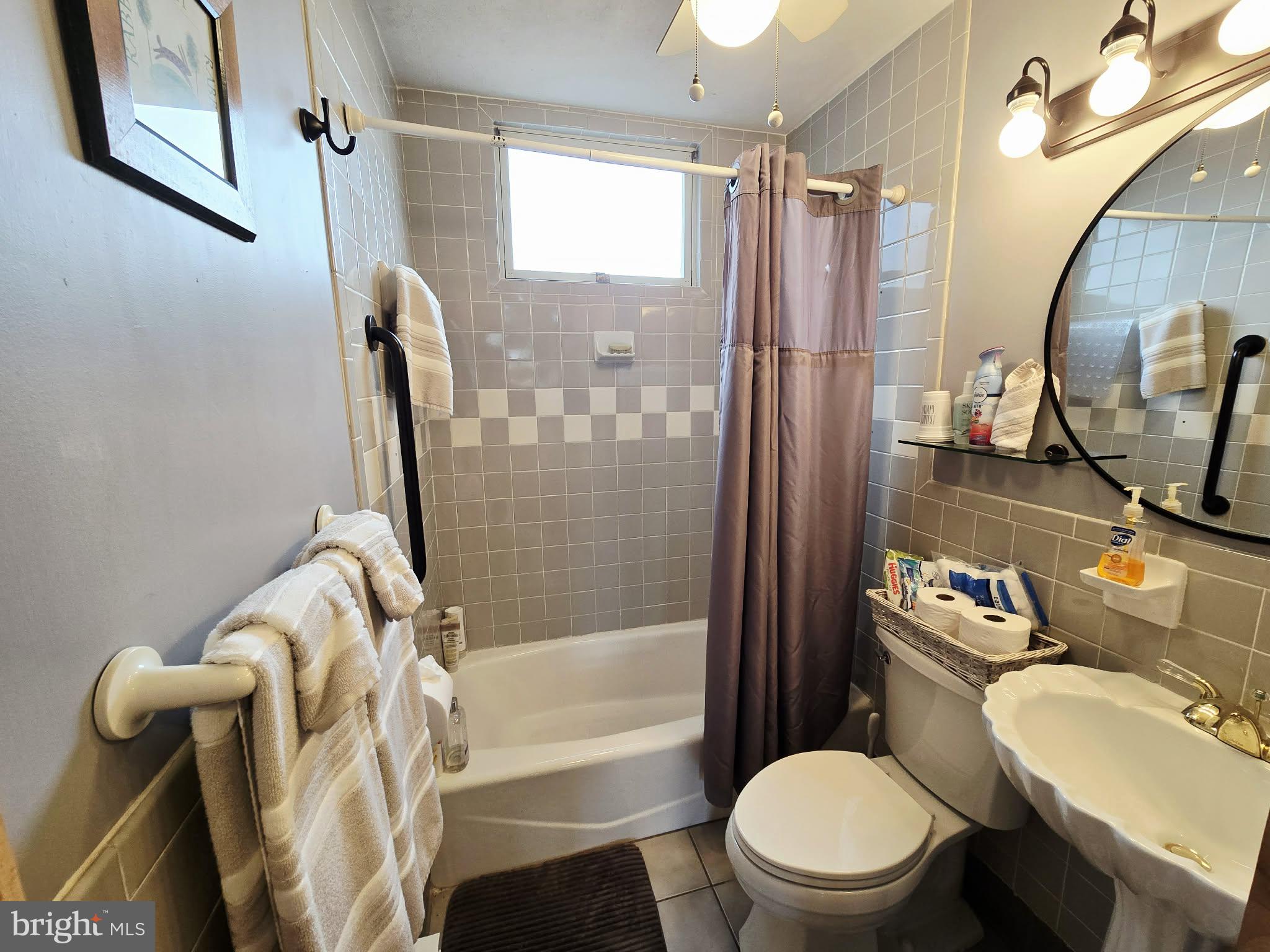 1120 Sandy Ridge Road Sugar Grove, WV 26815 - Photo 17 of 53 a bathroom with a sink toilet and shower