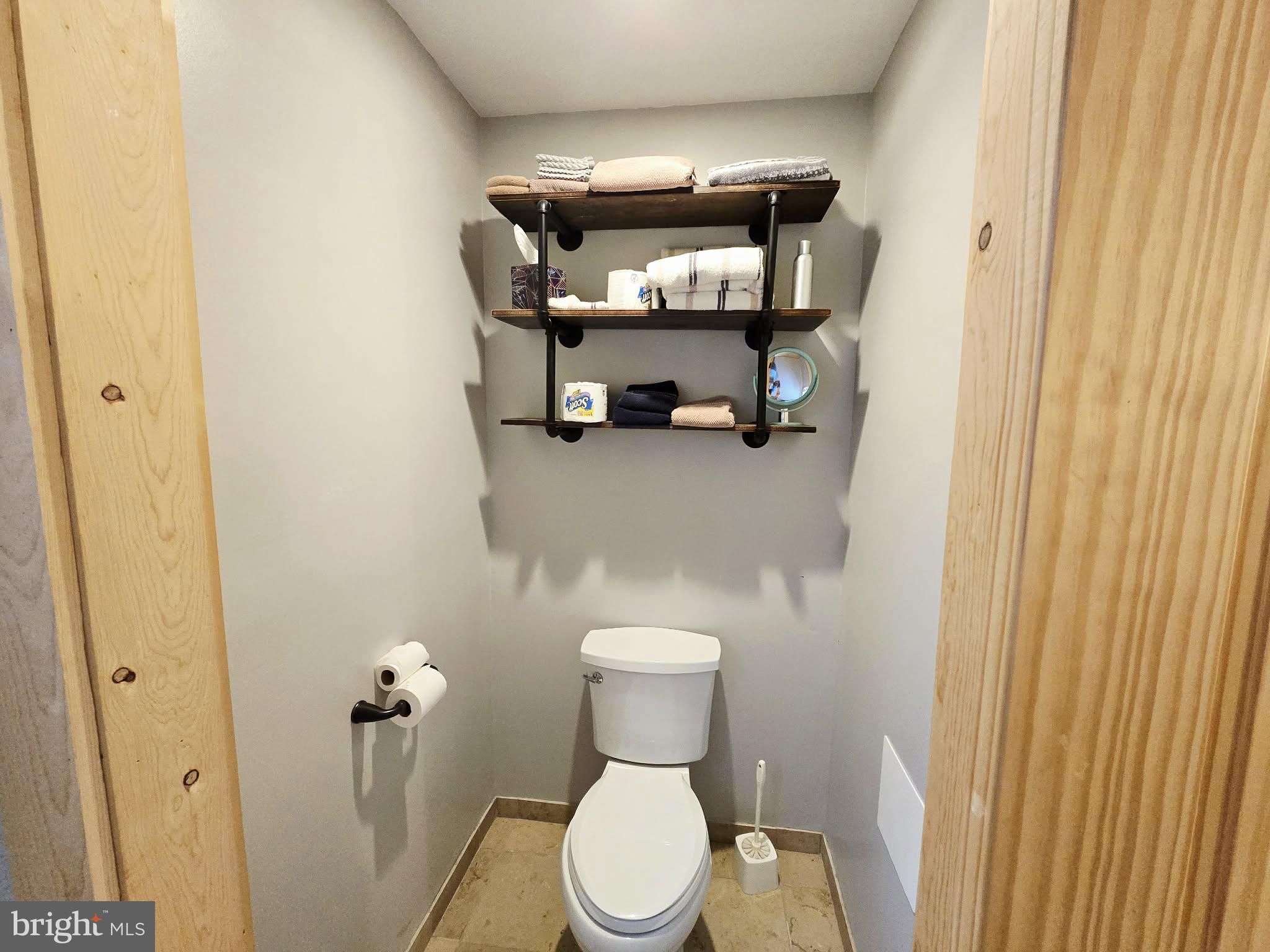 1120 Sandy Ridge Road Sugar Grove, WV 26815 - Photo 25 of 53 a bathroom with a toilet and a sink