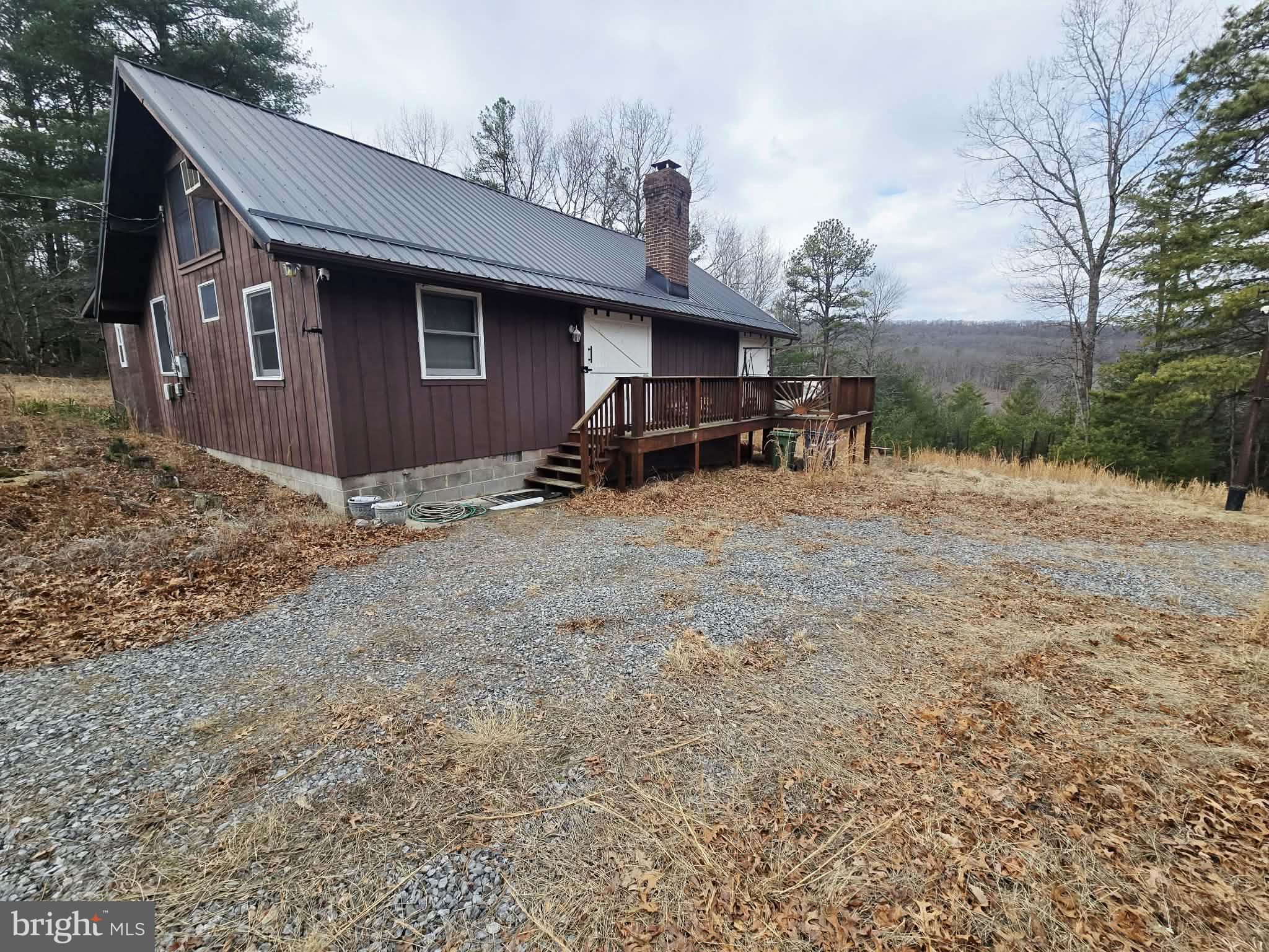 1120 Sandy Ridge Road Sugar Grove, WV 26815 - Photo 30 of 53 a view of a house with backyard and sitting area