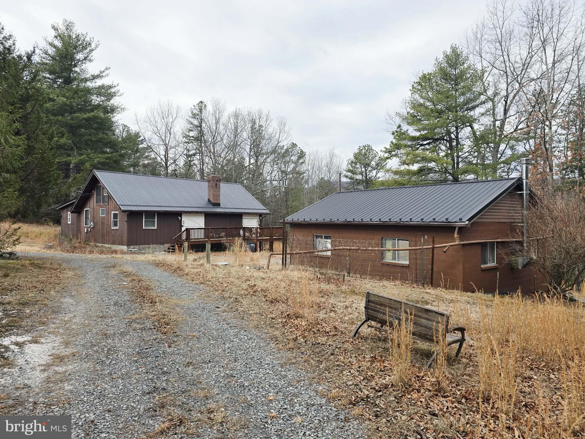 1120 Sandy Ridge Road Sugar Grove, WV 26815 - Photo 35 of 53 a backyard of a house with table and chairs