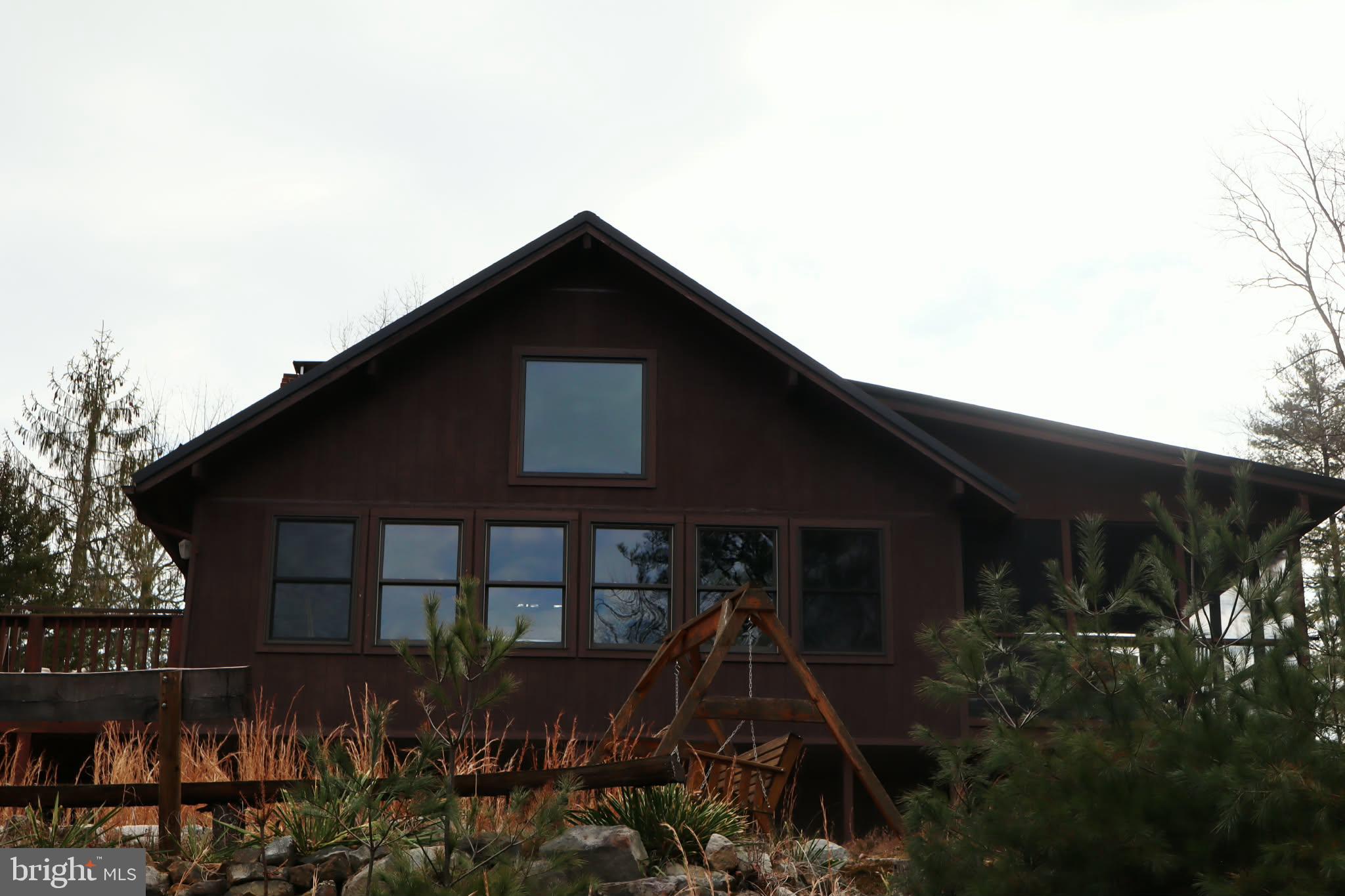 1120 Sandy Ridge Road Sugar Grove, WV 26815 - Photo 39 of 53 a front view of a house with garden