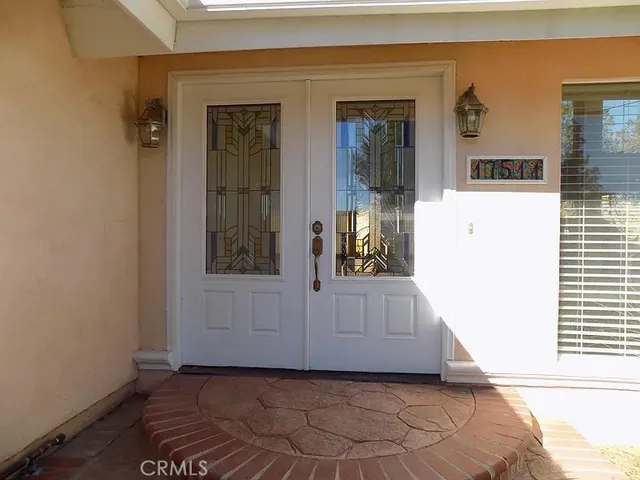 a view of front door with hallway