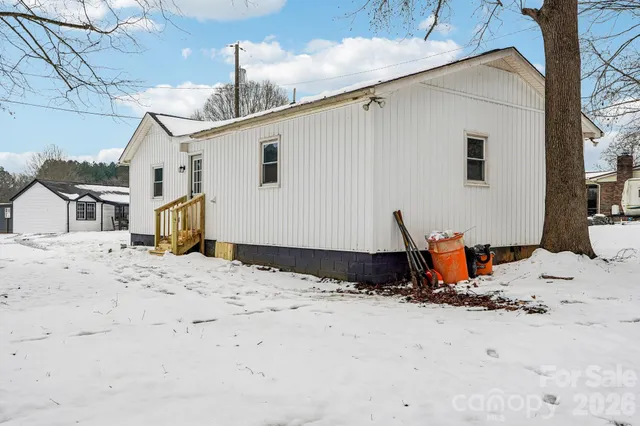 a view of a backyard of snow